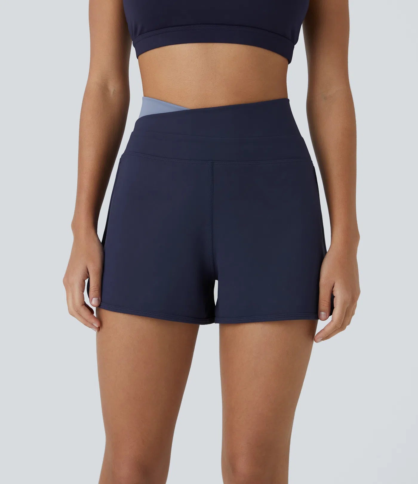 Softlyzero™ Plush High Waisted Yoga Short with Criss Cross Color Block and Curved Hem