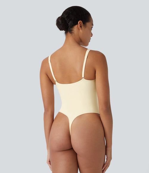 Flow seamless shaping bodysuit with adjustable straps and zip