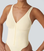 Flow seamless shaping bodysuit with adjustable straps and zip