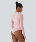Fitted thermal work bodysuit with round neck, buttons and long sleeves