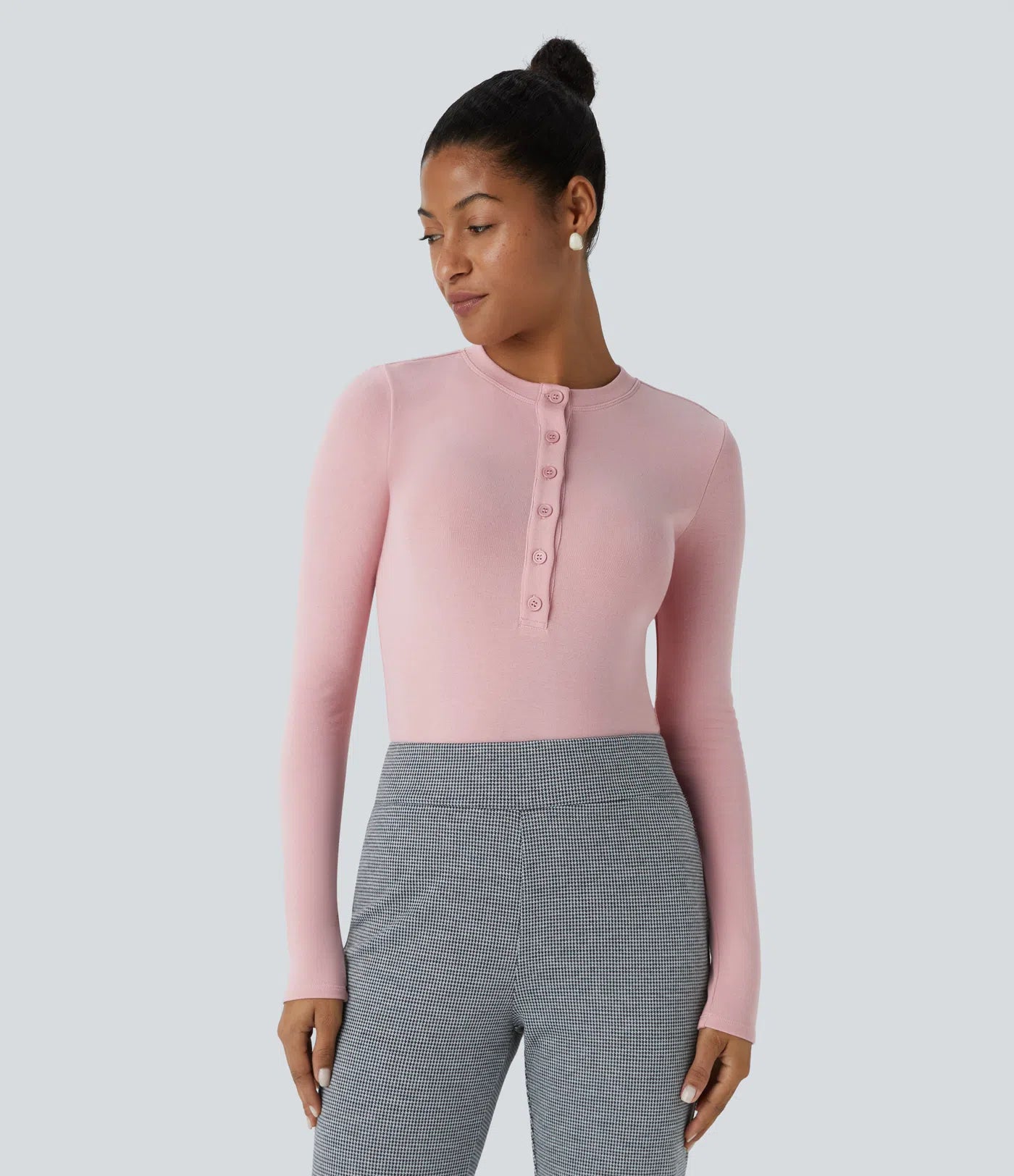 Fitted thermal work bodysuit with round neck, buttons and long sleeves