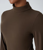 Casual bodysuit with high neck, long sleeves, in ribbed fabric