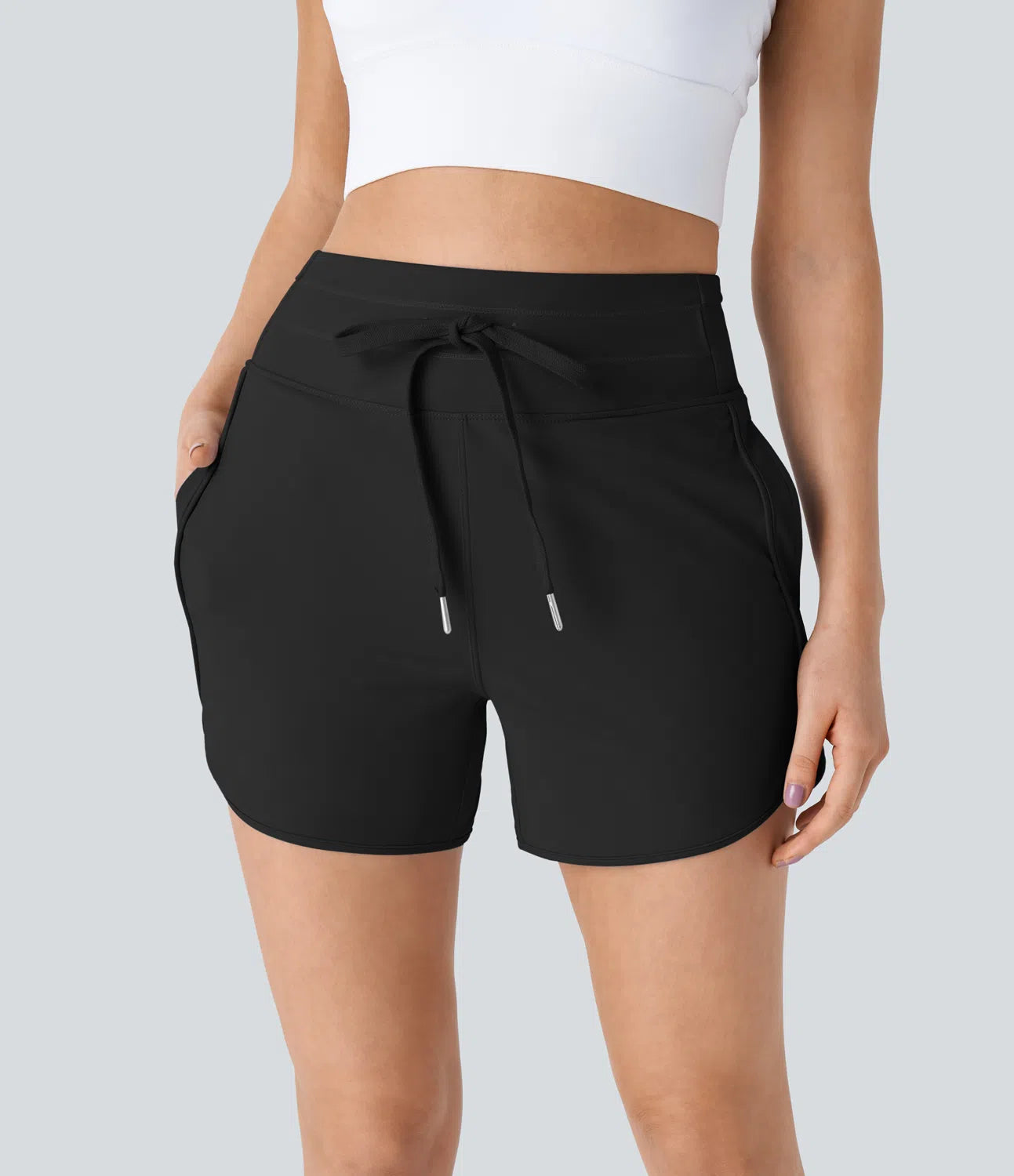 High Waisted Yoga Shorts with Drawstring Multiple Pockets and Curved Hem