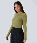 Casual ribbed knit bodysuit with crisscross lacing and long sleeves